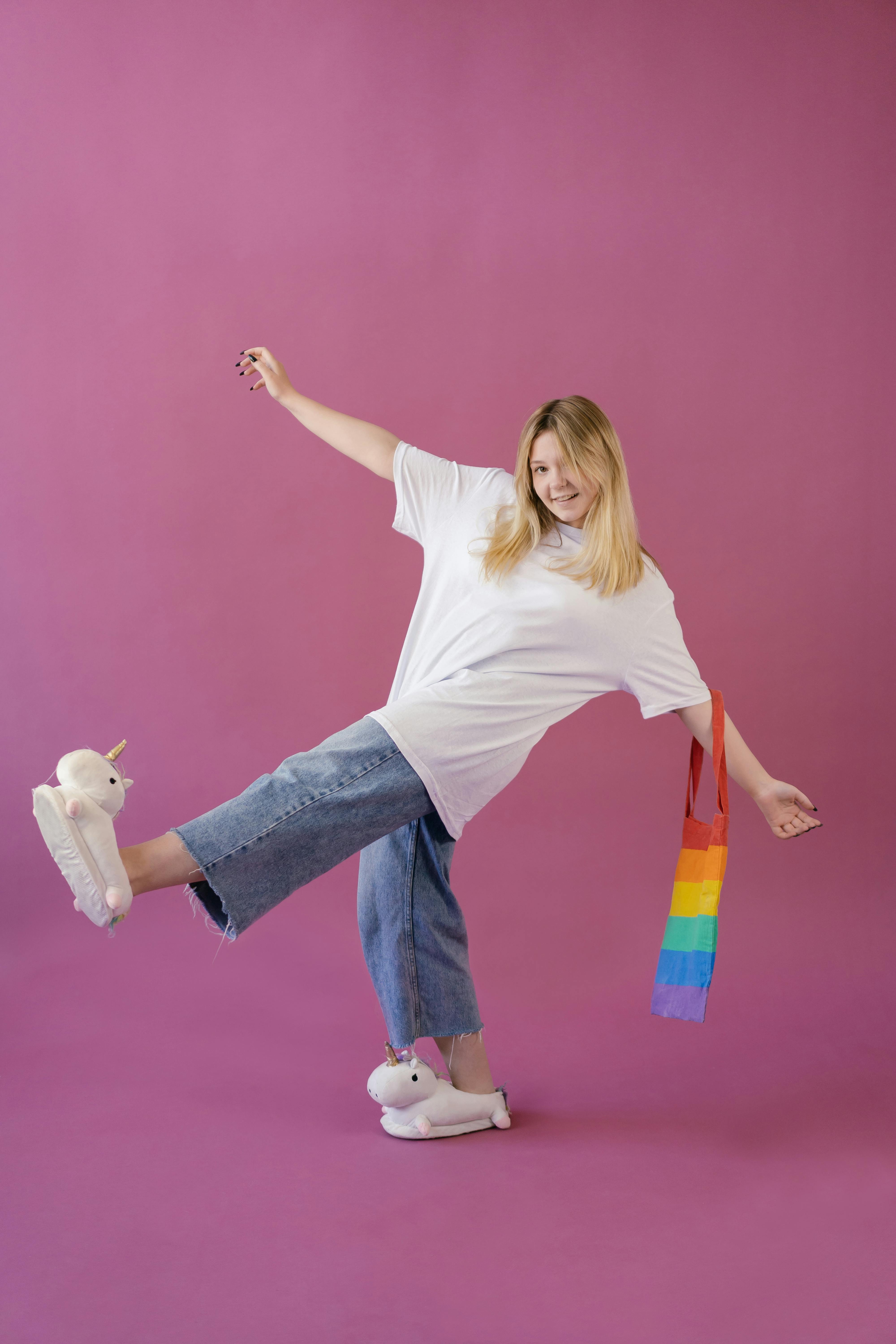 A Person Holding a Rainbow Tote Bag · Free Stock Photo