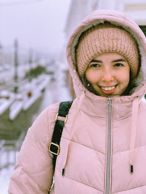 Photo of Woman Wearing Pink Jacket