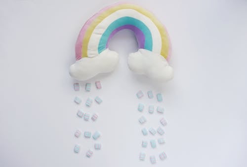 Rainbow Shaped Pillow on White Surface