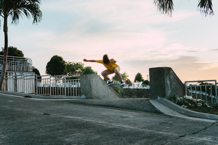 A Person Doing Skateboarding Trick