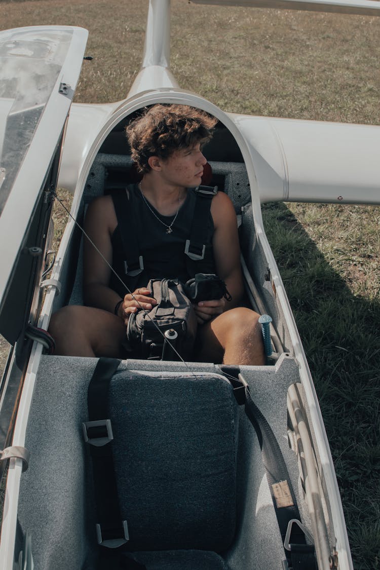 Man Sitting Inside An Ultralight Aviation