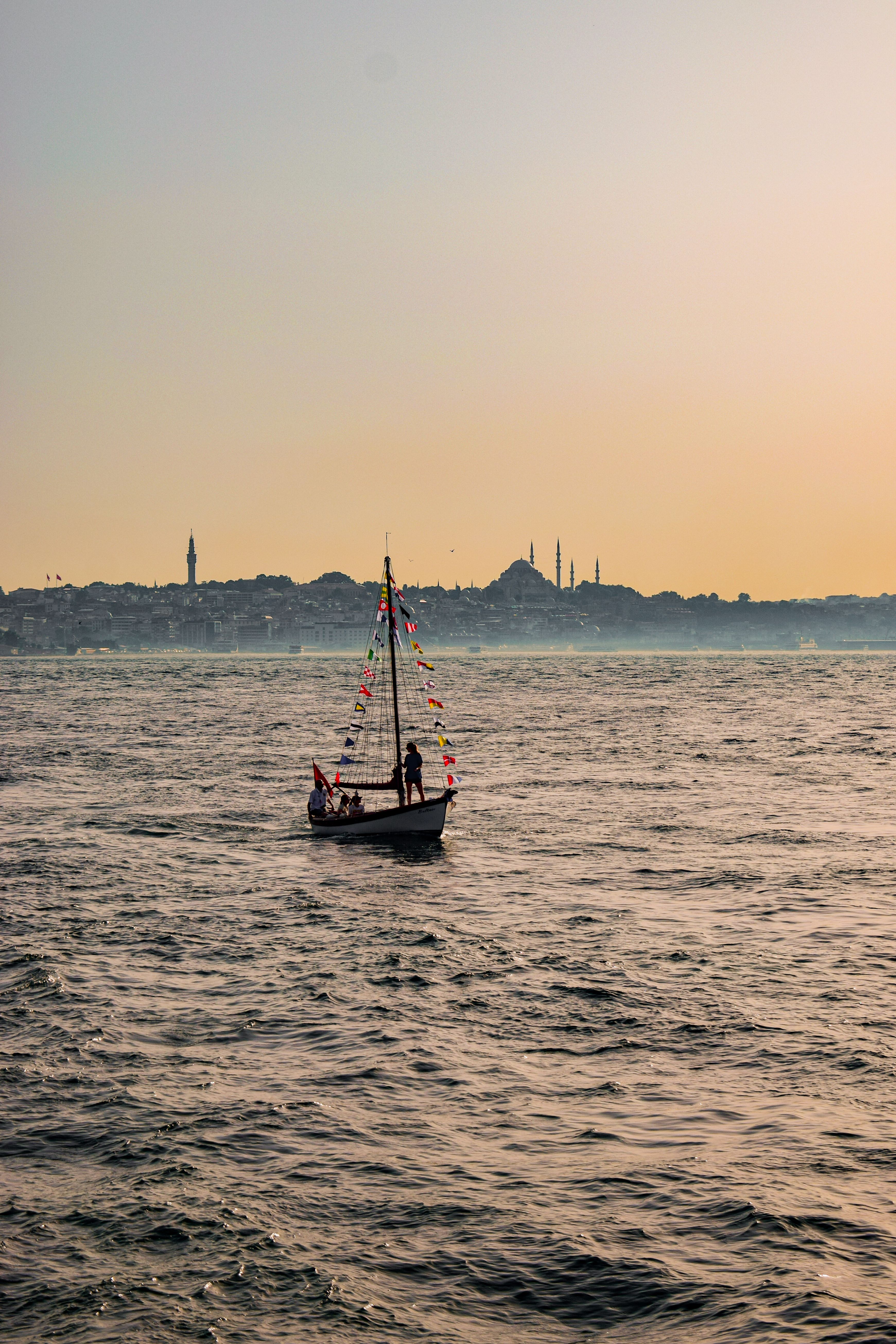 Boat Sailing in Body of Water · Free Stock Photo