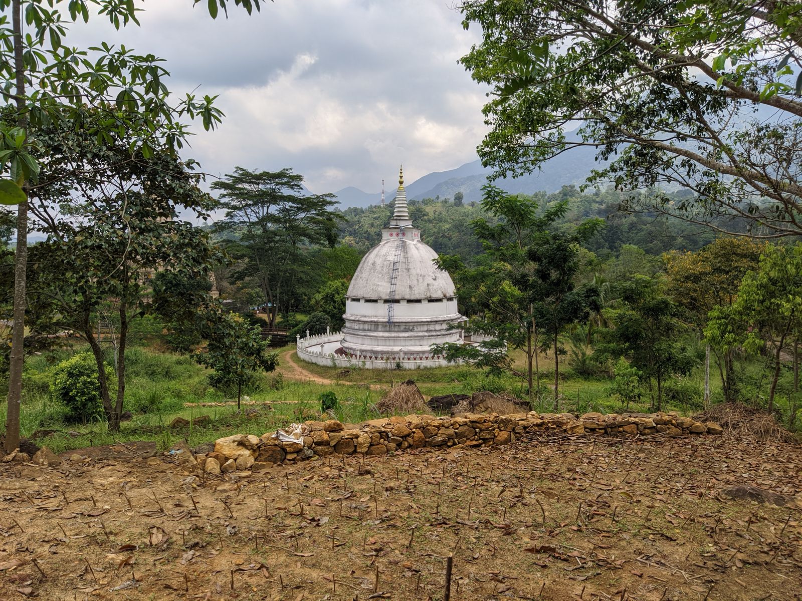 Rathganga Stupa surrounded by dense greenery in Sri Lanka — photo by Chethana Nirman on Pexels
