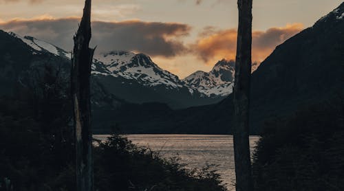 Free Snowy Mountains near a Lake Stock Photo