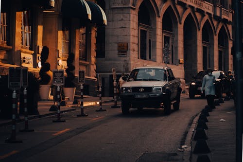 Cars in a Traditional Narrow Alley