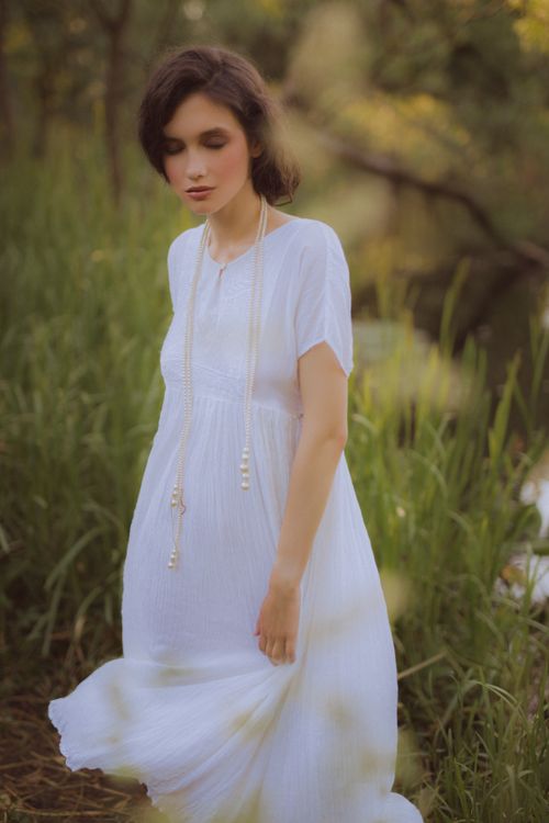 Woman in White Dress Standing on Green Grass Field · Free Stock Photo