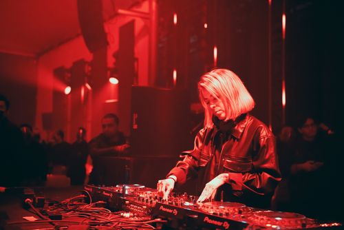Free A captivating DJ performance with vibrant red lighting at a lively nightclub in Naucalpan de Juárez, Mexico. Stock Photo