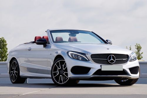 Free Sleek Mercedes convertible parked outdoors, showcasing luxury design and elegance. Stock Photo