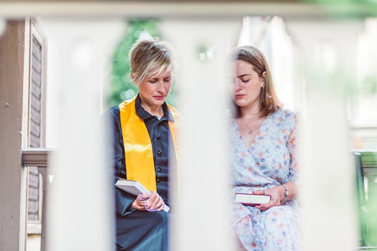 Two Women Praying Together