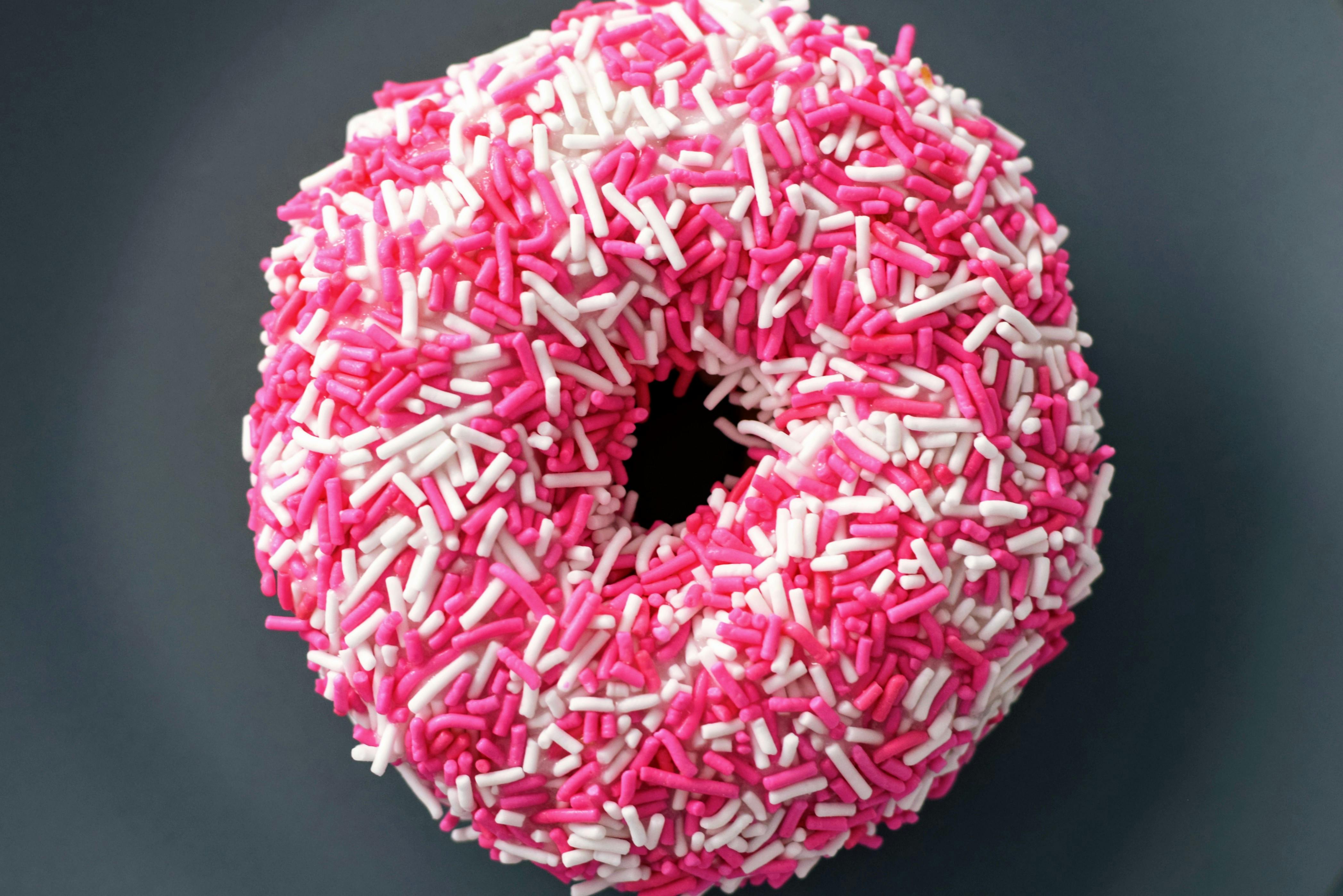 pink donut with sprinkles