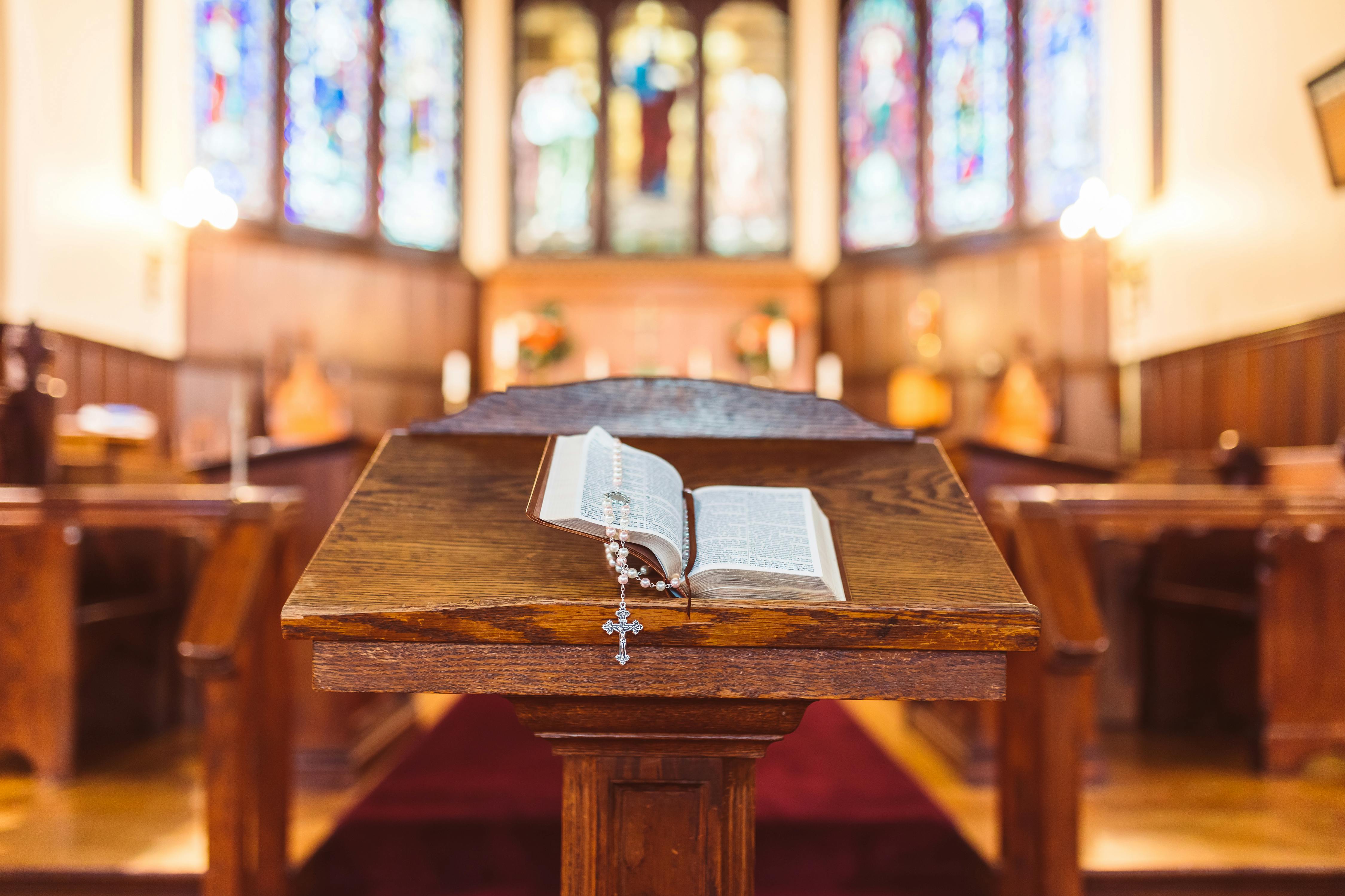 rosary on the open bible