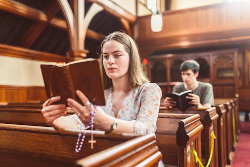 People Praying in a Church 