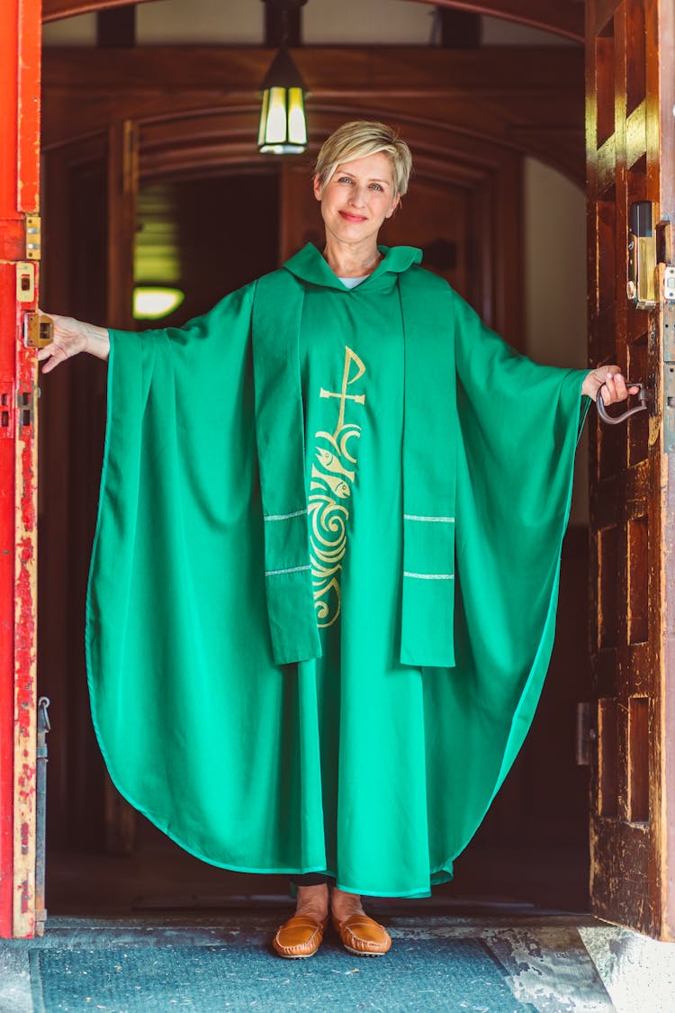 Female Priest In Green Robe 