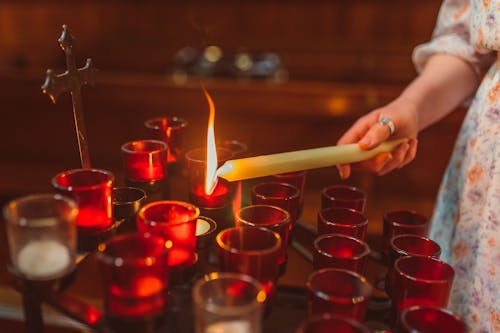 Holding a Lighted Candle