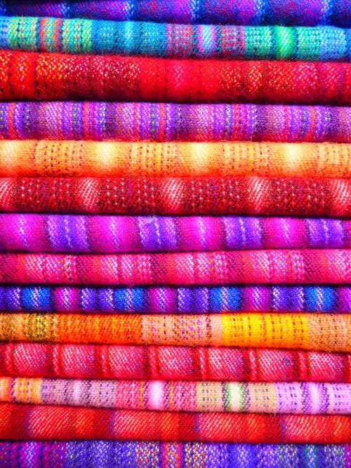 Free Pink and Blue Textile Near Yellow Textile Stock Photo
