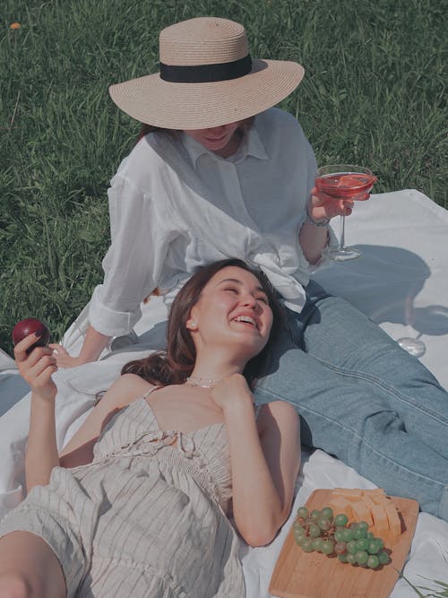 Free Women Having a Picnic Together Stock Photo