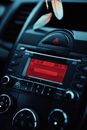 A Black Car Stereo Connected to the Aux