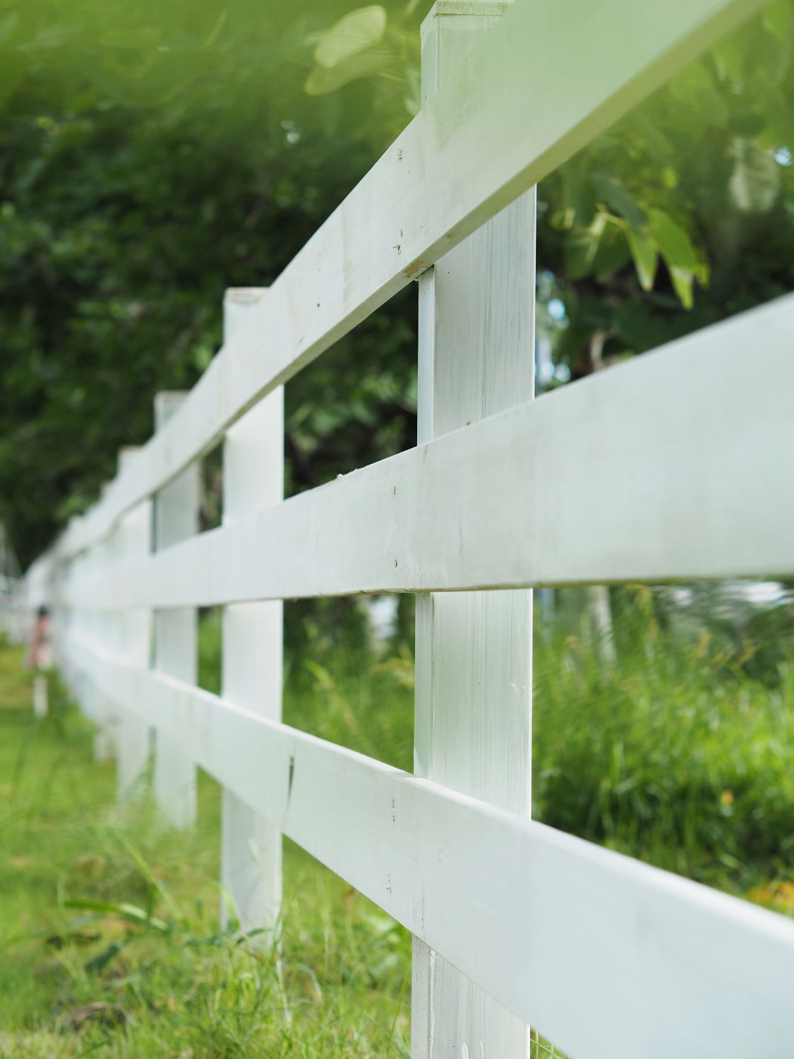 White Wooden Fence on Green Grass Field · Free Stock Photo