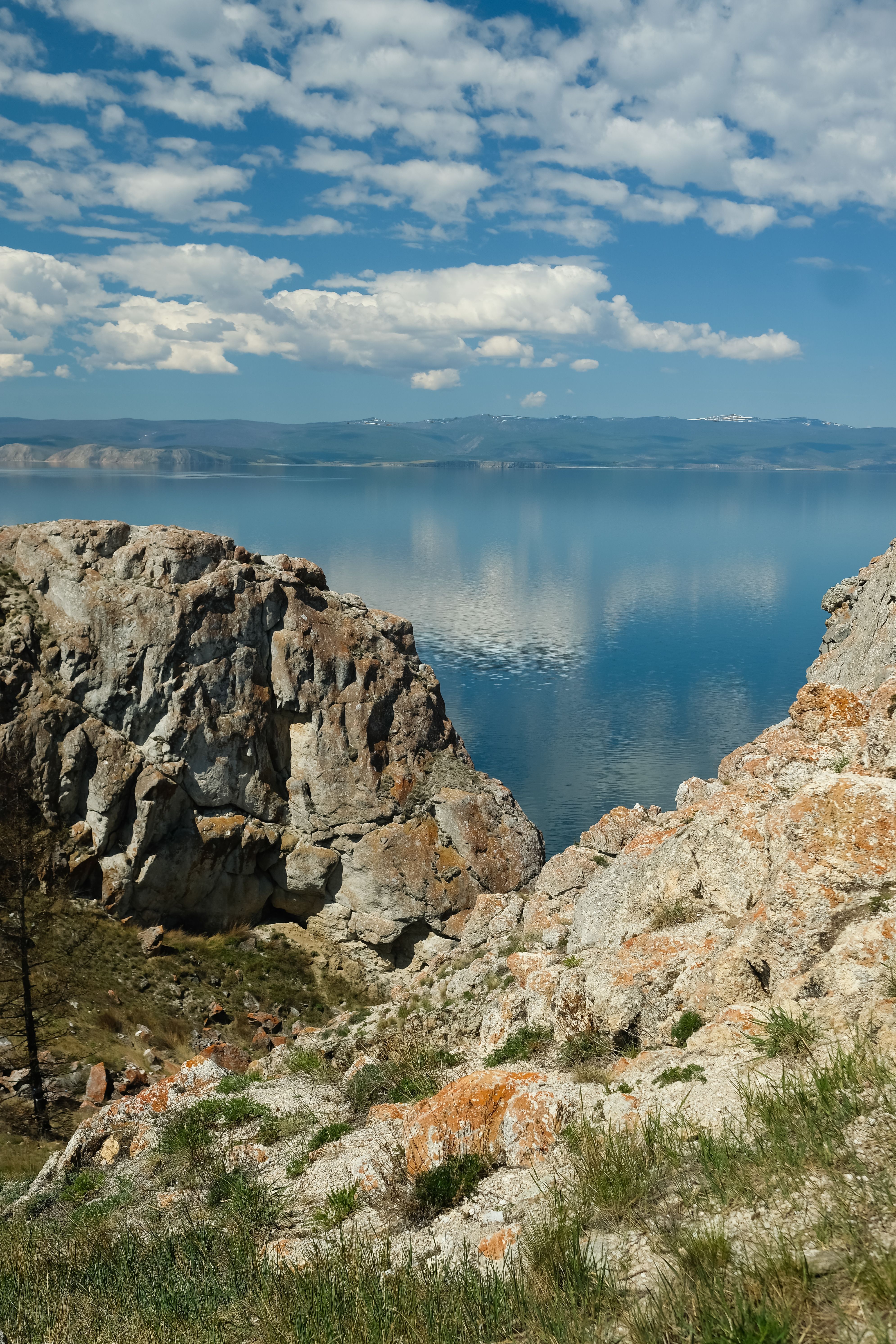 A Rock Formations Under the Blue Sky and White Clouds · Free Stock Photo