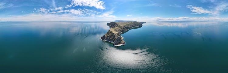 Panoramic View Of Ocean Under Blue Sky