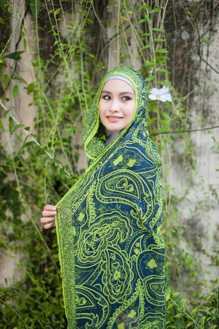 A Woman In Green  Scarf