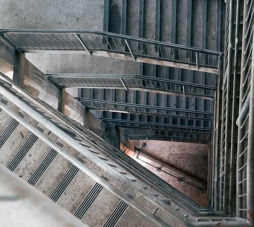 Free Highly detailed shot of a geometric concrete staircase, showcasing modern architectural design. Stock Photo