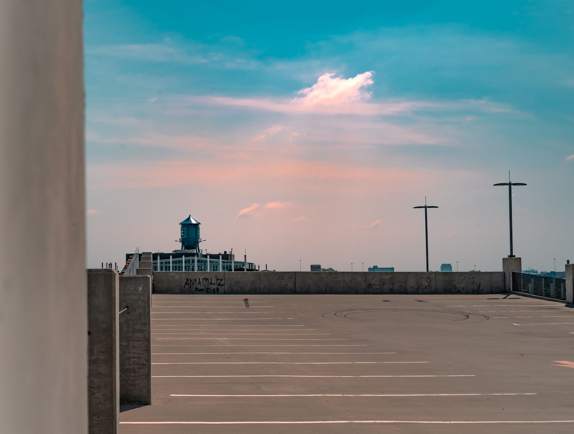 Empty Parking Lot on Roof of Building
