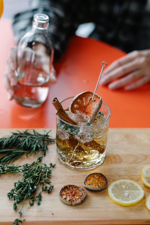 Clear Drinking Glass With Brown Liquid