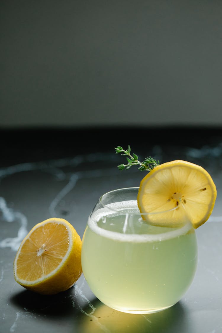 Clear Glass Cup With Lemon Juice