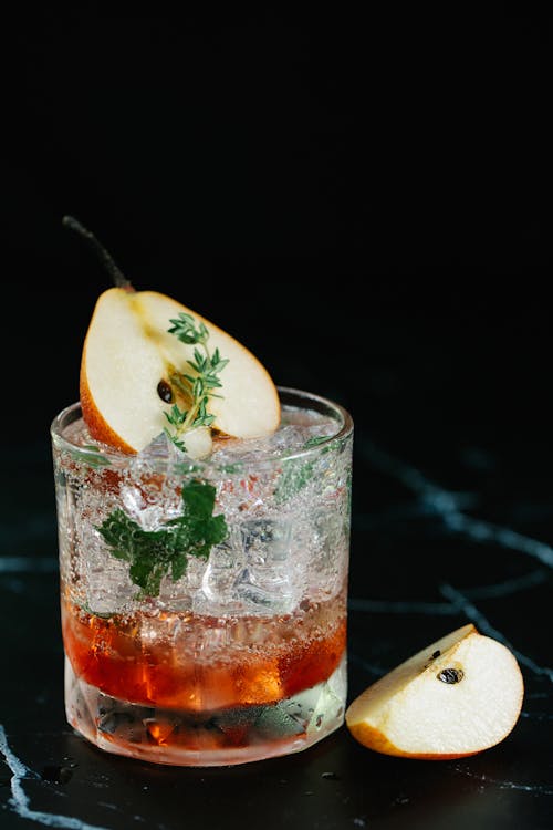 Free Sliced Pear on Cocktail Drink Stock Photo