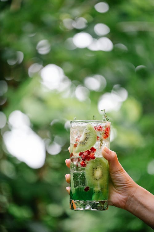 A Person Holding a Drink