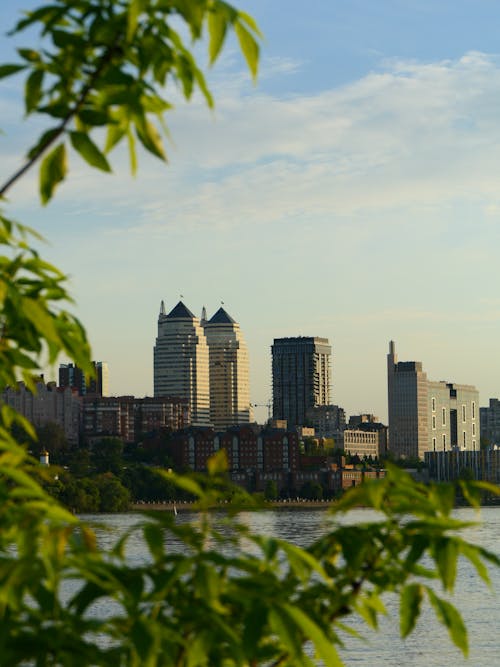Free City Skyline Seen from Across River Stock Photo