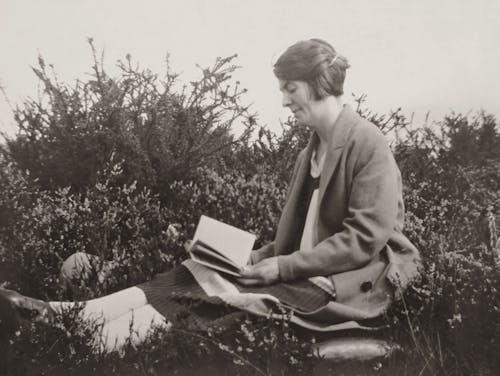 Old Photo Of Woman Reading A Book In The Garden