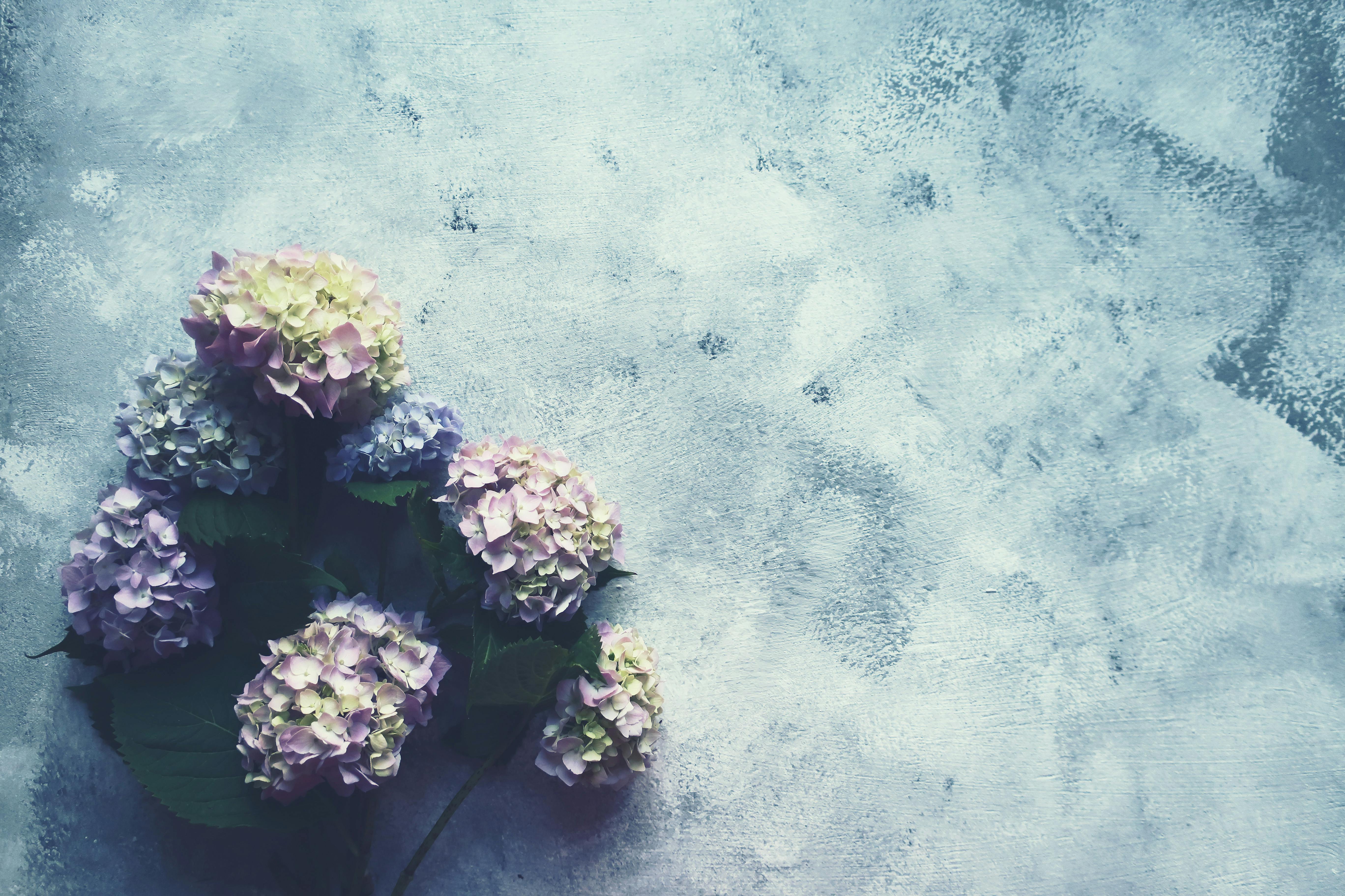 A person crushing a cigarette in their hand, symbolizing the commitment to quitting smoking.