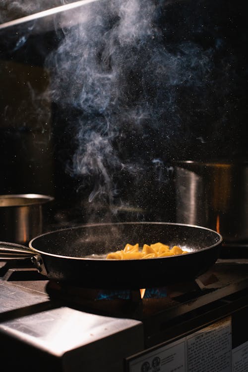 Free 
A Cooking Pan on a Stove Stock Photo