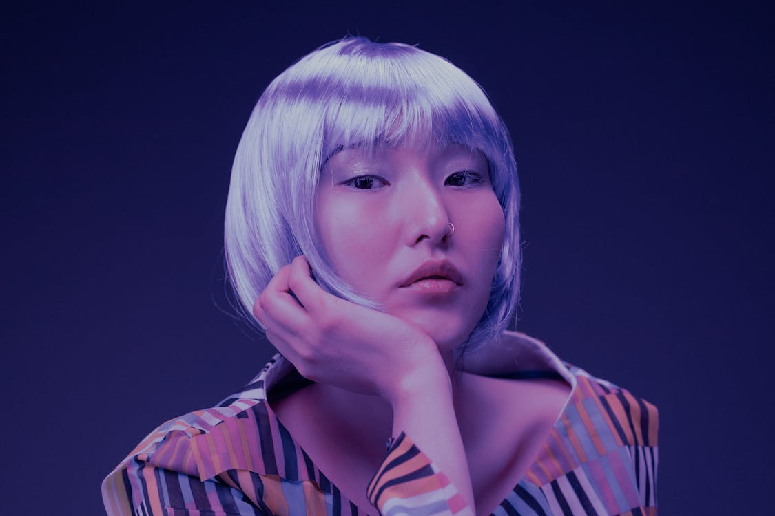 Woman in Striped Shirt With Gray Hair and Nose Ring