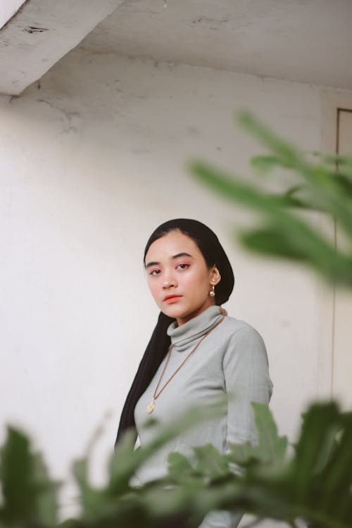 A Woman wearing Turtleneck Long Sleeves