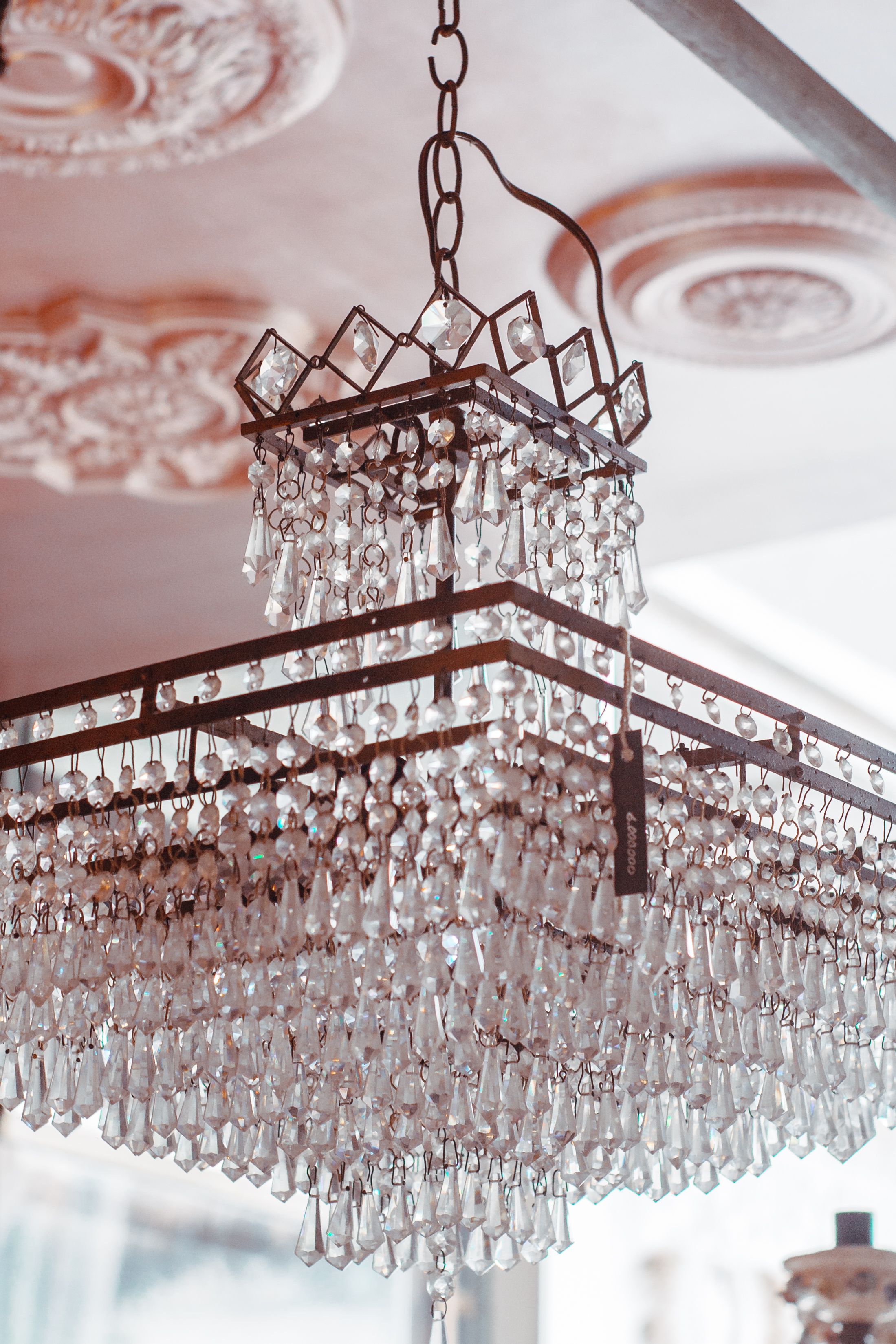 View of Silver Metal Chandelier Hanging on White Ceiling · Free Stock Photo