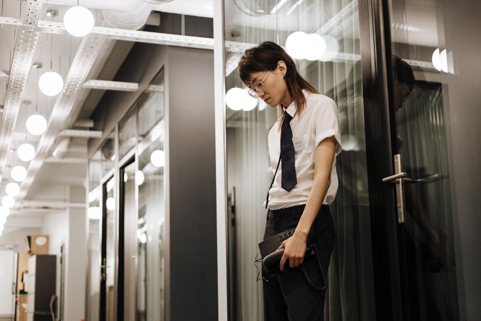 tired worker locked office door