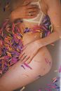 Woman in White and Pink Floral Bikini Bottom