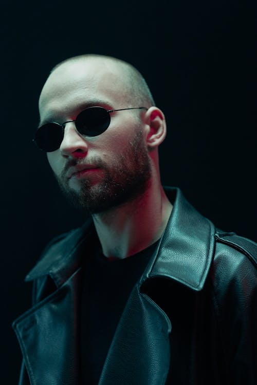 Man in Black Leather Jacket Wearing Sunglasses