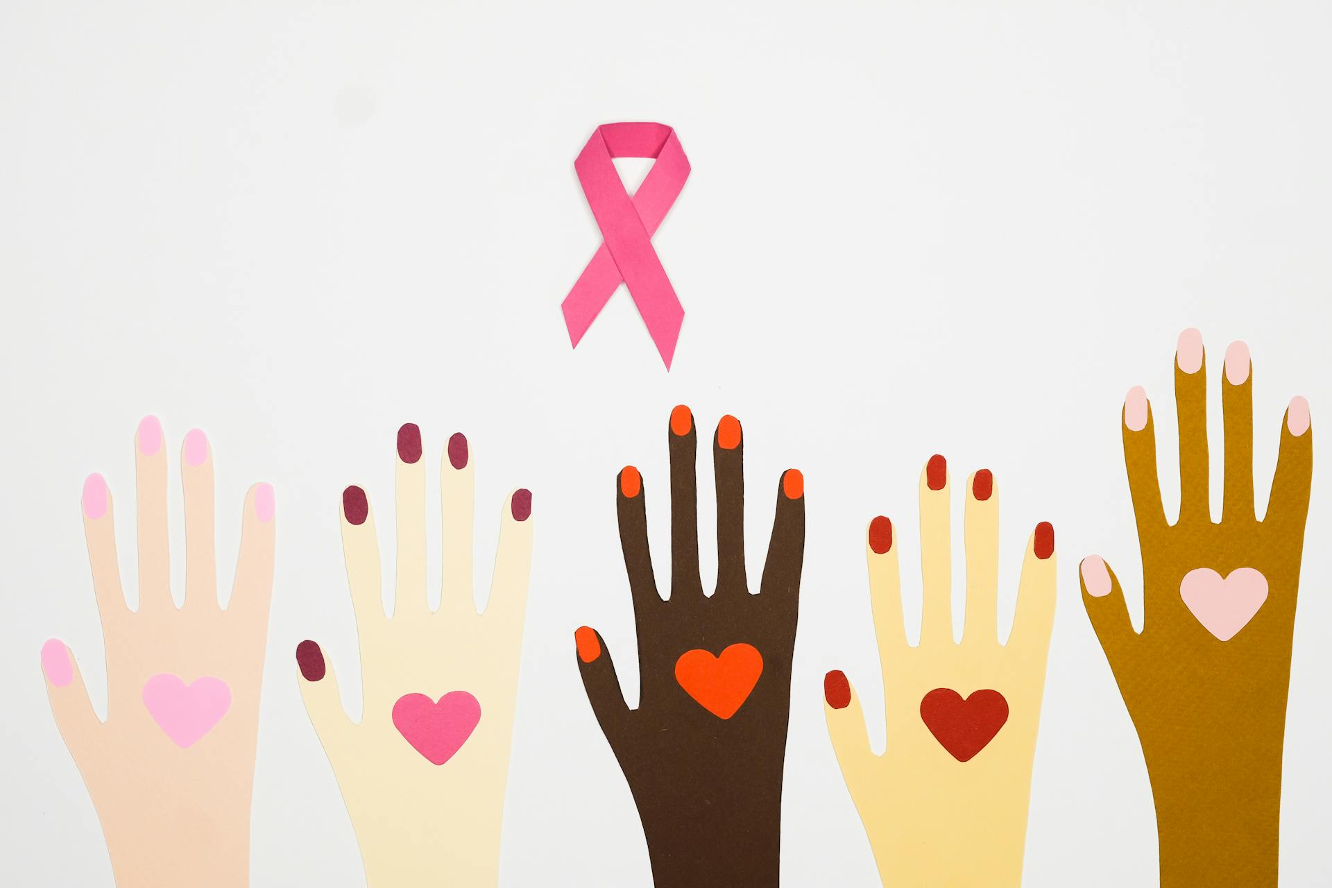 An Illustration of Hands with Heart Drawing Near Pink Ribbon