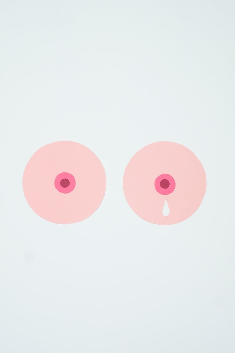 An Illustration Of Milk Leaking On The Breast