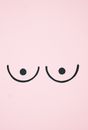 Illustration of Breasts on a Pink Background