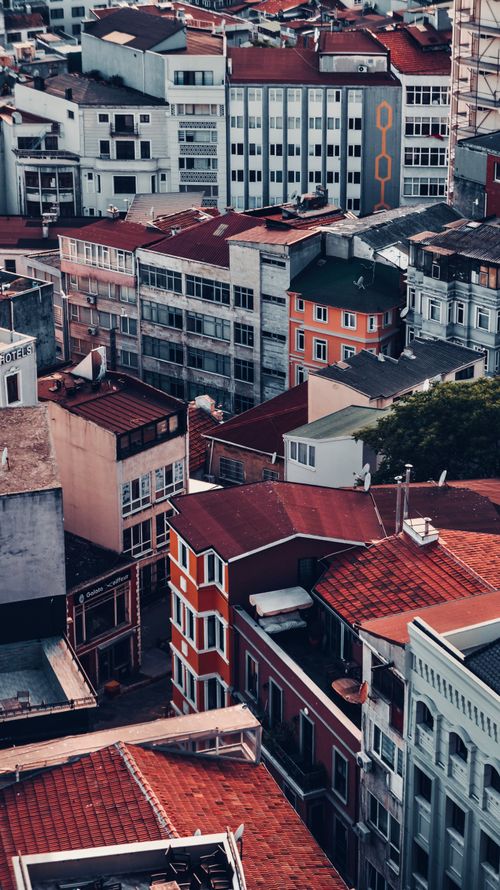 Free Colorful rooftops and architecture in Istanbul, Turkey captured from above, showcasing urban charm. Stock Photo
