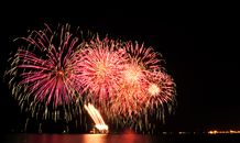 Red and White Fireworks Display during Night Time