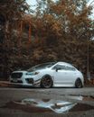 White Subaru Car Parked on Street Side