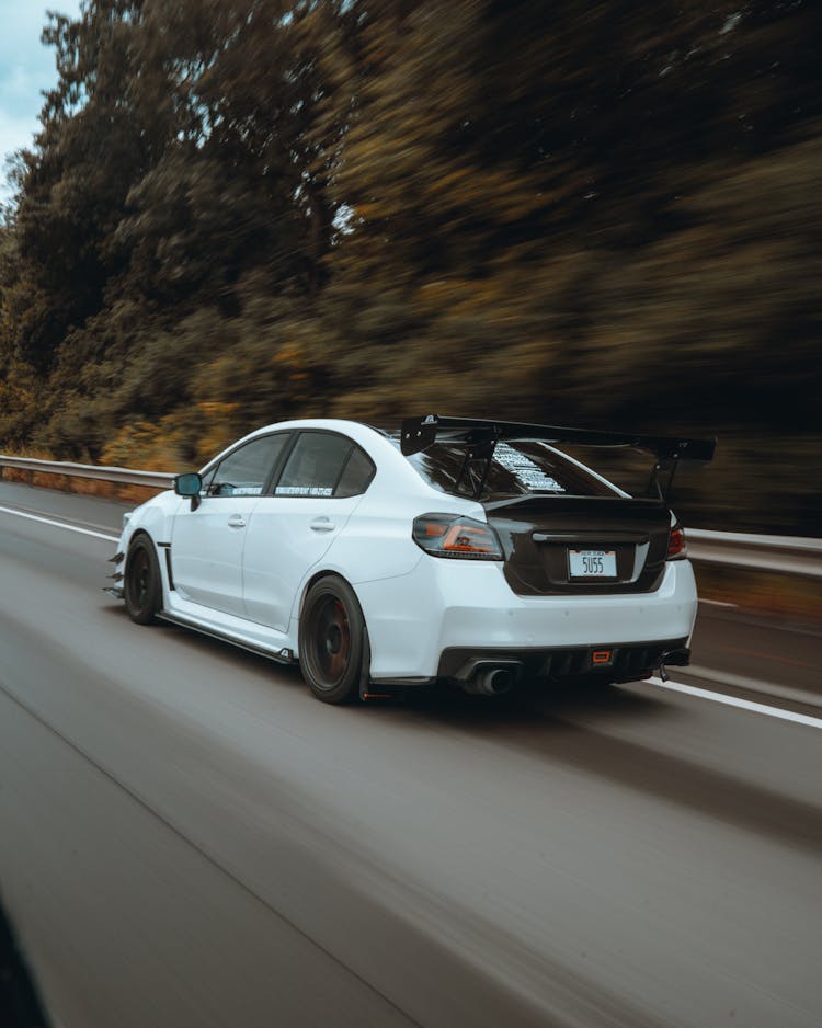 White Subaru Sedan On The Road