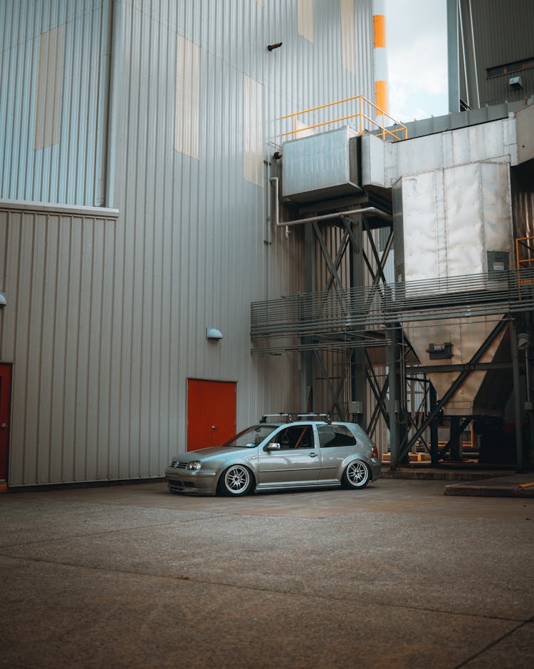 Car Near Modern Warehouse