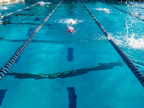 Kostnadsfri bild av blått vatten, idrottare, simbassäng